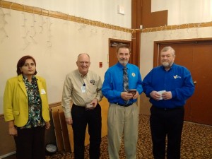 George, Tim, and Marty accepting their appreciation gift from Shagufta
