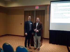 Rich S accepting token of appreciation from Kelly B